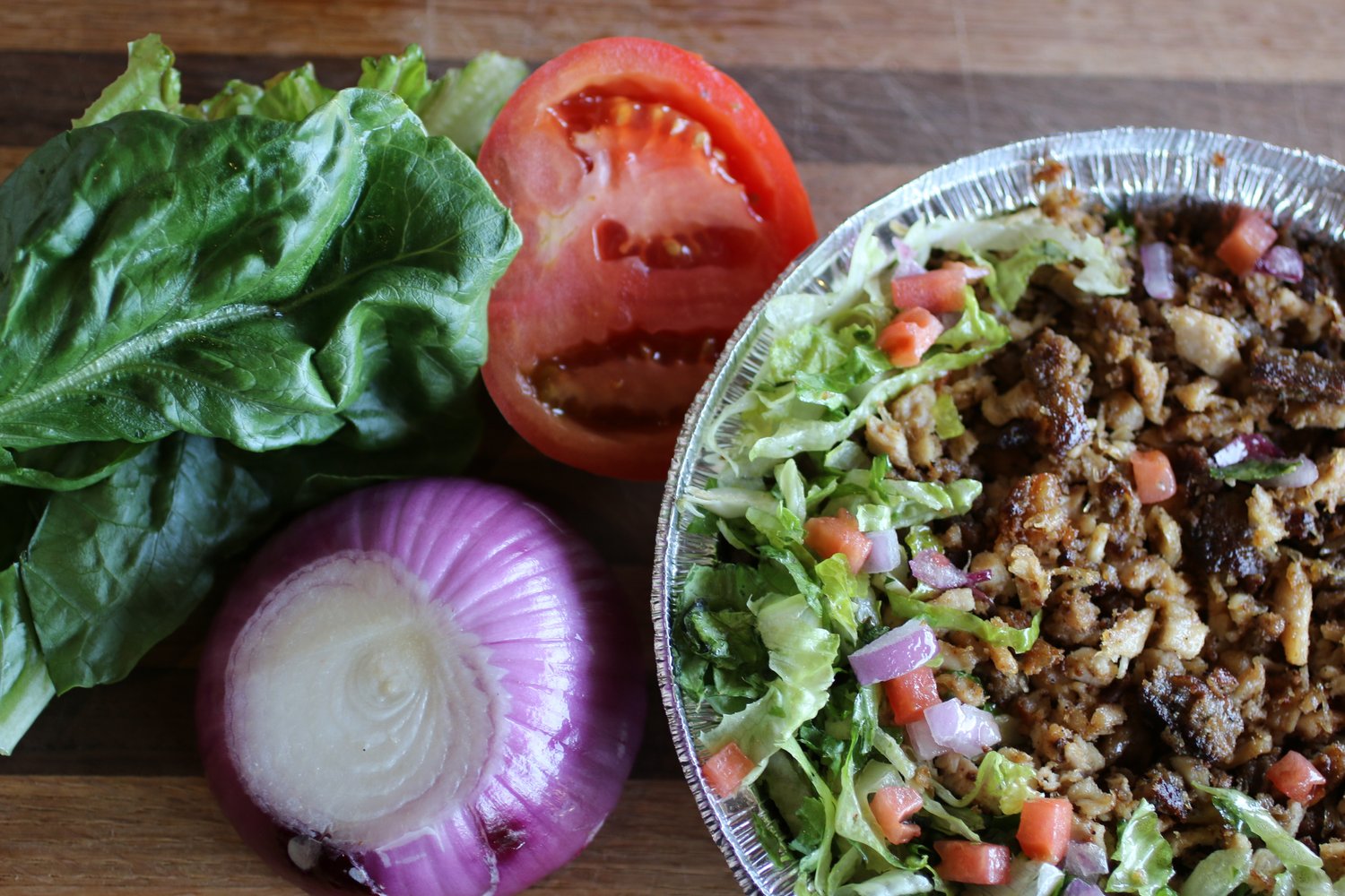 Fresh vegetables alongside a generous New York Eats platter